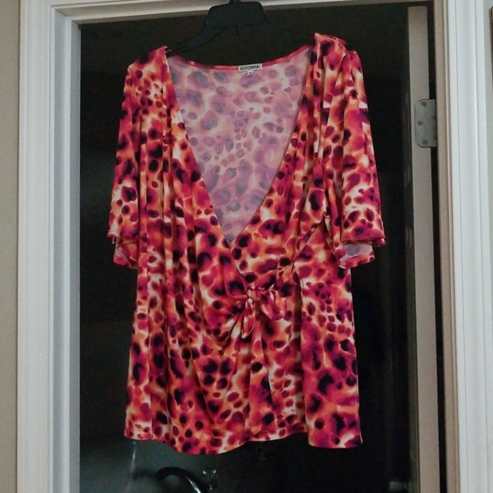 Adjustable faux wrap top